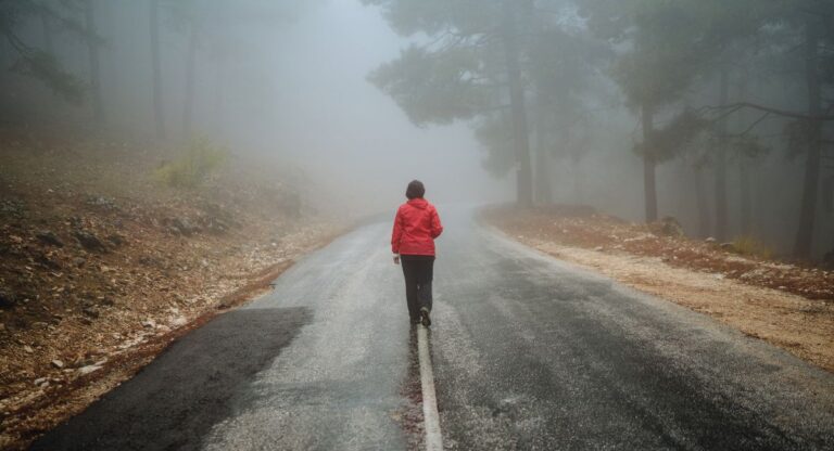 starting a new life alone, woman walking alone