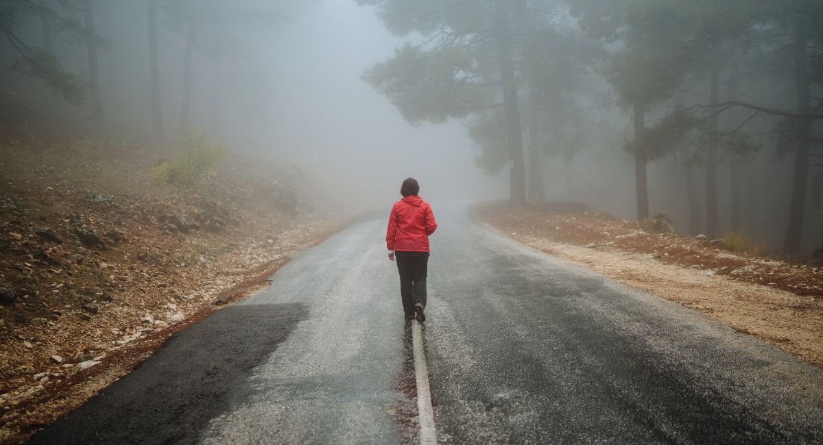 starting a new life alone, woman walking alone