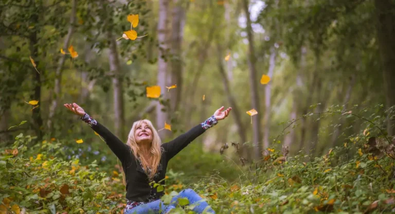 thankful for another year quotes,happy woman in leaves