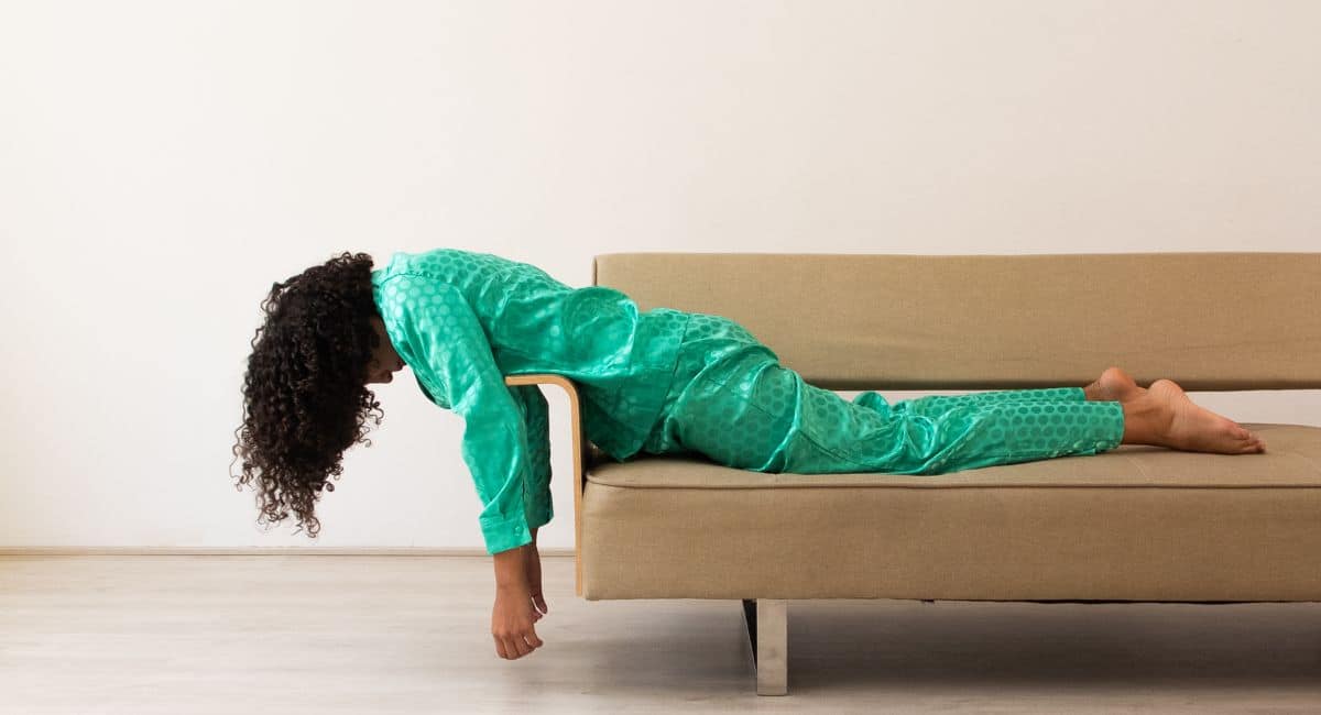 feeling stuck in life woman lying on couch