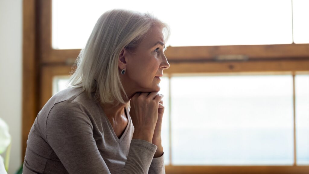 woman over 50 thinking