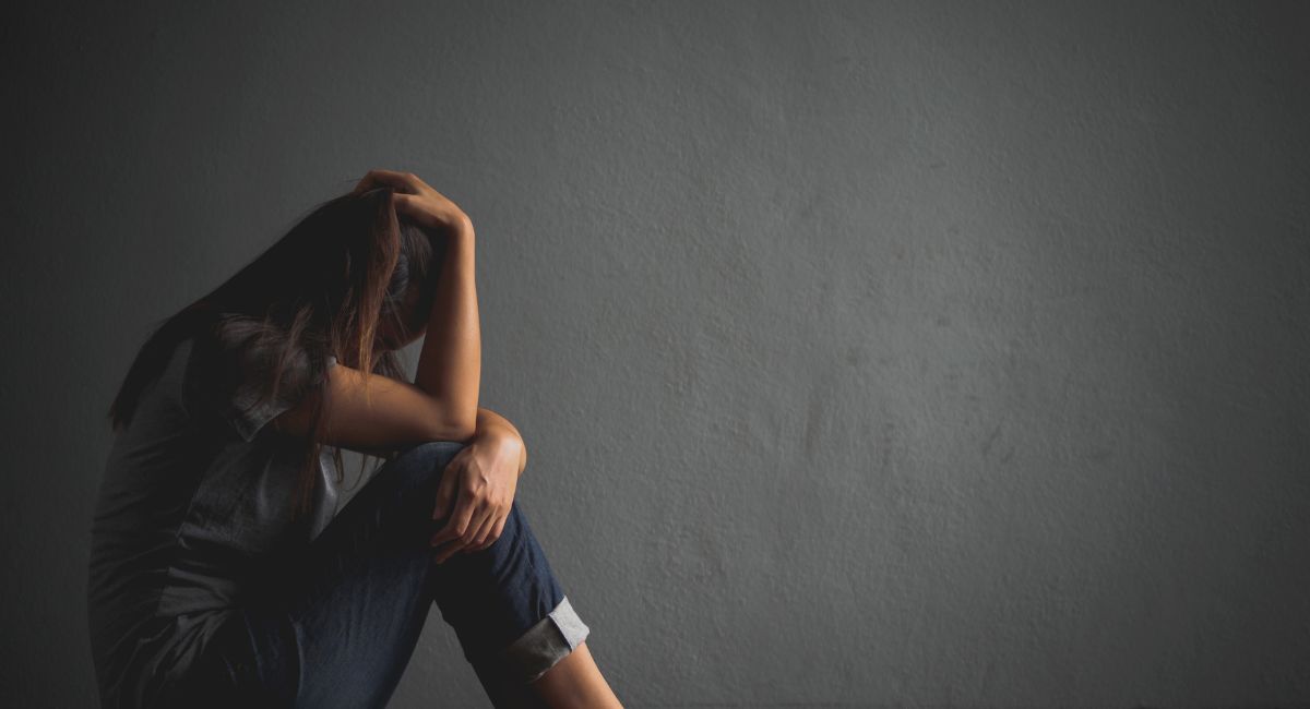 overcome emotional pain, sad woman