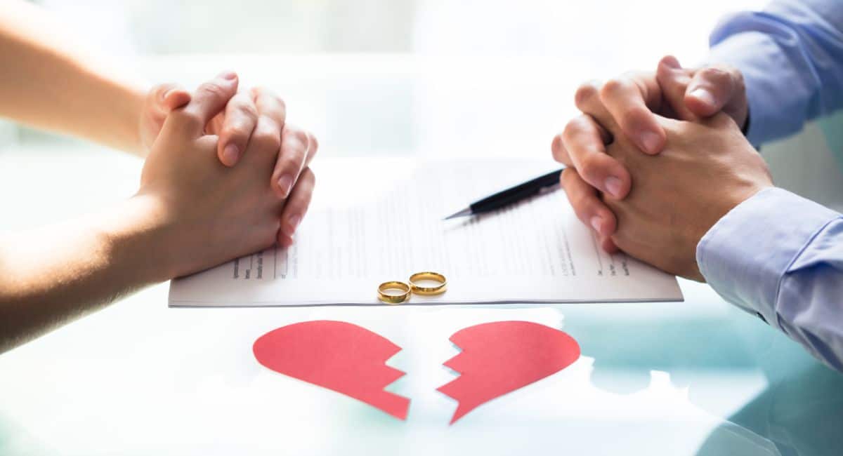 getting over a divorce, broken heart, wedding bands and divorce papers