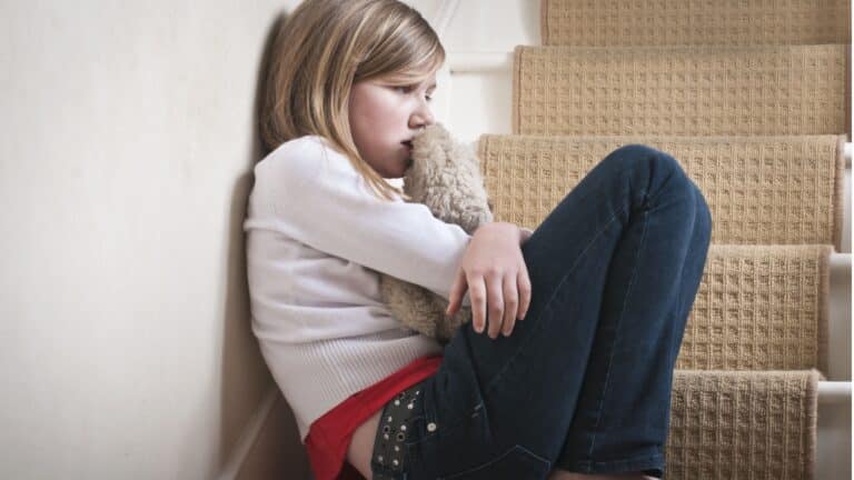 sad girl sitting alone