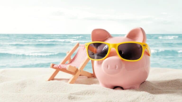 piggy bank beach travel save money